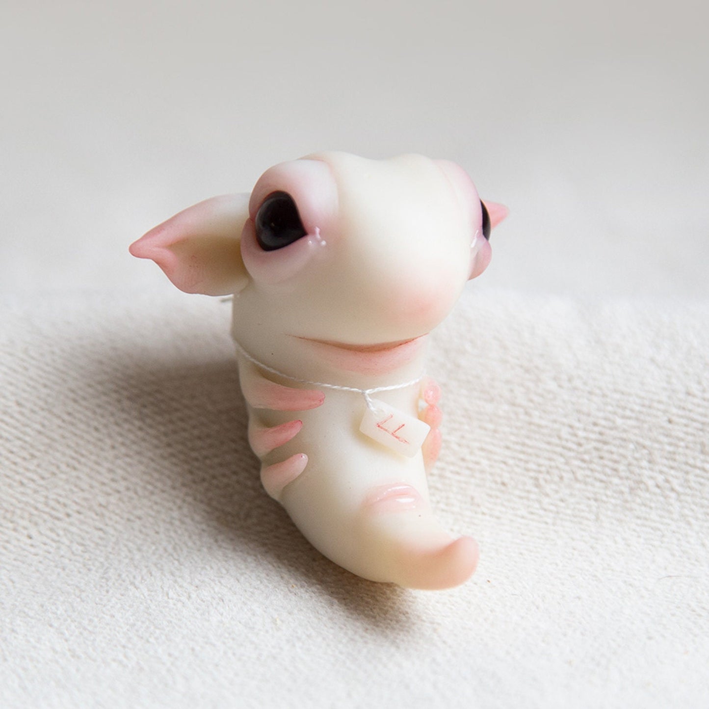 Creepy cute alien embryo monster doll figurine, polymer clay sculpture with rune protection